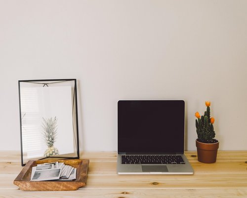 Clean and ergonomic home office setup in a modern apartment
